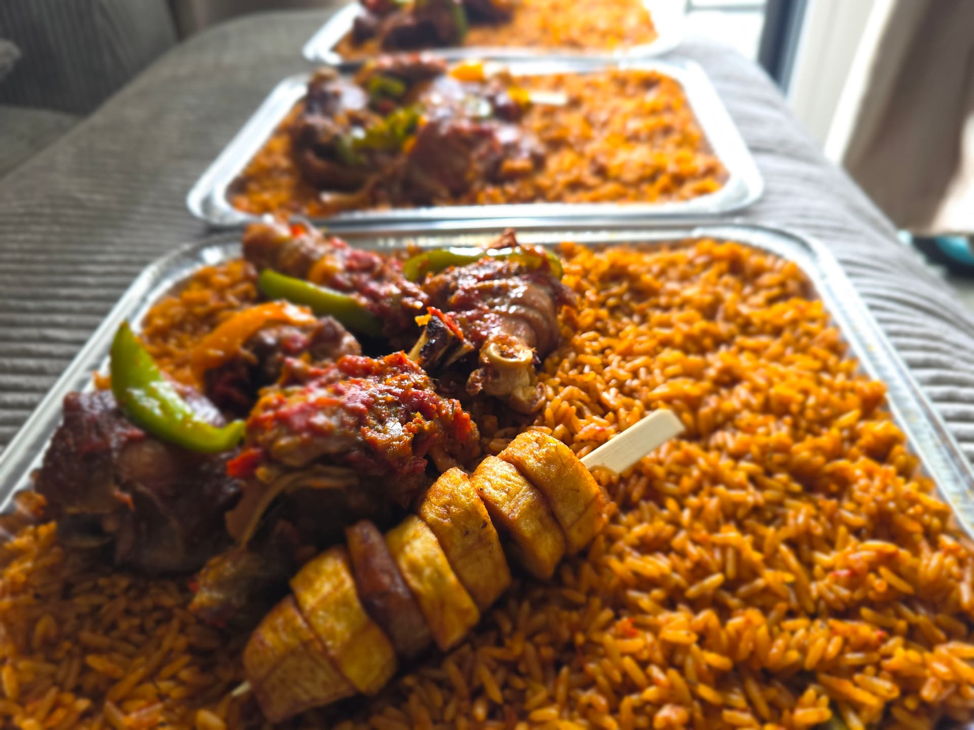 Jollof rice, chicken and plantain combo